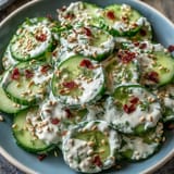 Creamy viral cucumber salad topped with everything bagel, so delicious.