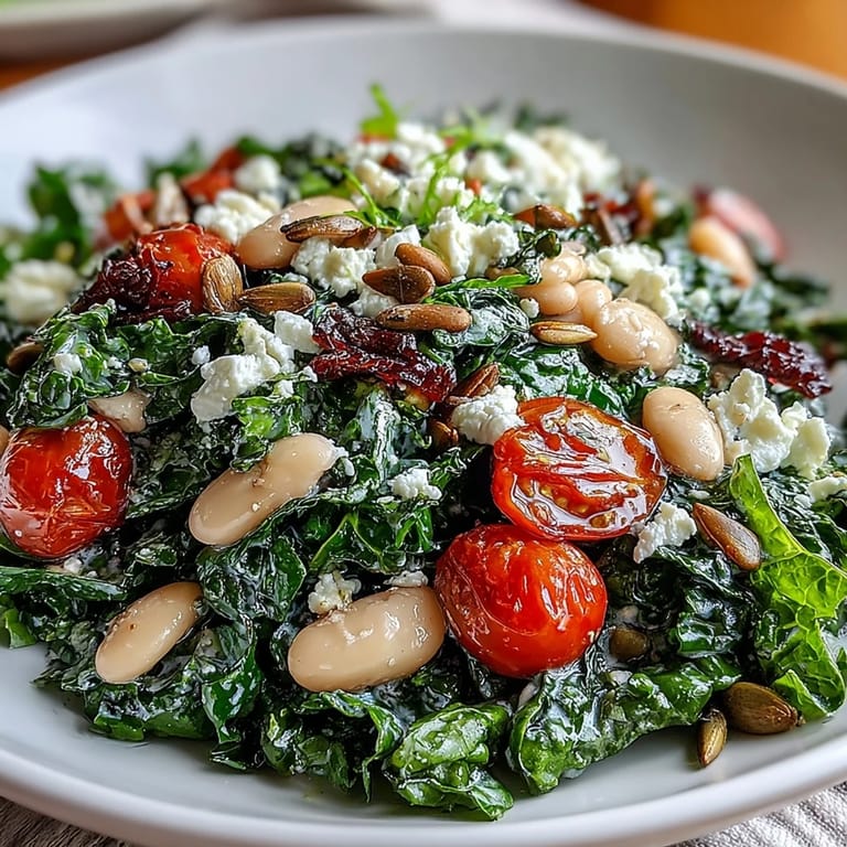 Bright Mediterranean White Bean and Kale Salad served in a white ceramic bowl.